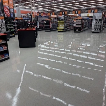 Completed floor in a retail aisle at the Waupaca project